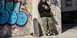 Stylish model in 레플리카 streetwear in urban environment showing trendy fashion vibe